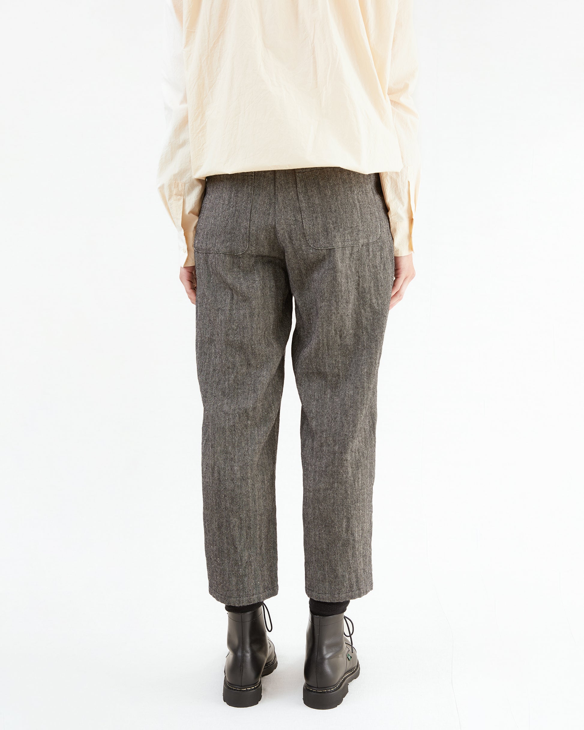 Apuntob Pleated Herringbone Trousers in Black/ Ecru