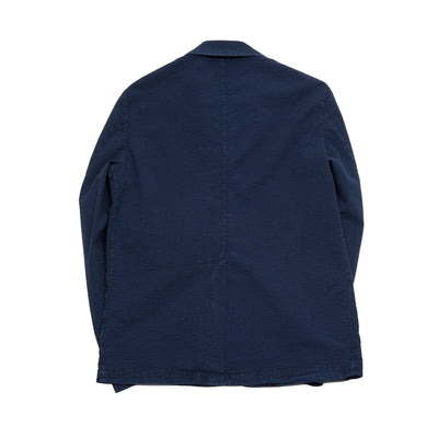 Barena Rafeda Fronda Overshirt in Navy cotton seersucker, washed for a soft 'worn in' look. Three button overshirt can be worn as a two button blazer with notched lapel, or with the top button closed as an overshirt. Three patch pockets, single button cuffs and single back vent. A refined take, on classic workwear.  97% Cotton, 3% Elastane.   Made in Italy.