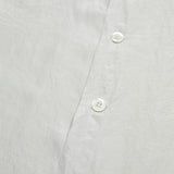 The Solana Tentor Shirt is made from pure ultra-soft silk which is lightweight and cool to the touch. Designed with a camp collar and a relaxed fit, this summer shirt defines casual elegance. 100% Silk. Made in Italy.