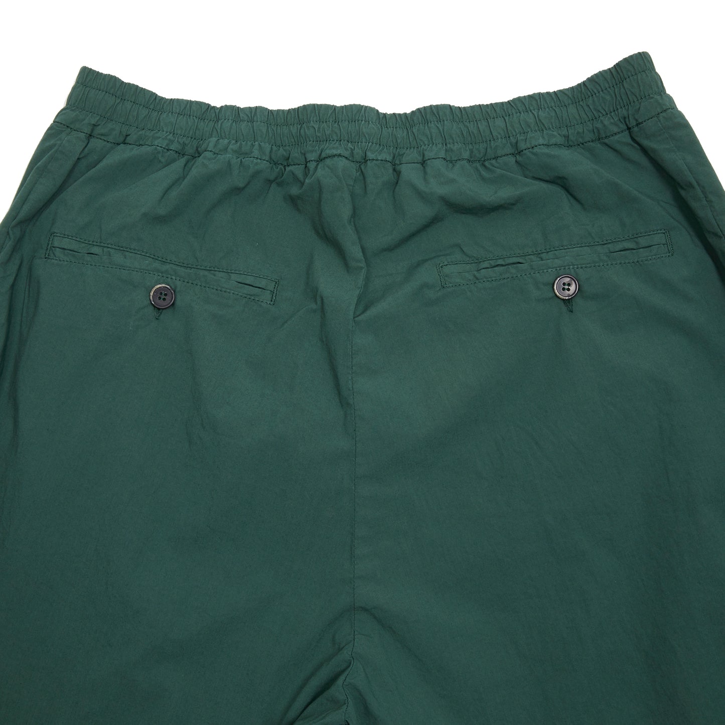The Ameo Pavion Trouser is a casual style with an elasticated drawstring waistband. Featuring vertical jetted side pockets, a zip fly, and two jetted pockets with buttons at the back. Crafted from a parachute cotton and garment dyed. 97% Cotton, 3% Elastane. Made in Italy.