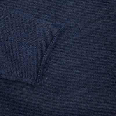 Lumiere sweater is a regular cut style and lightweight. Unfinished hem and cuffs for a relaxed look.  100% Cashmere.  Made in Scotland.