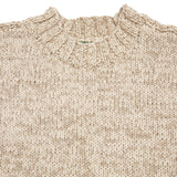 <p>Casey Casey Low Funnel Neck Sweater in Beige. Beautiful loosely hand knit sweater with drop sleeves in a cotton and virgin wool blend. The perfect relaxed summer layer.</p> <p>60% Cotton, 40% Virgin Wool.</p> <p>Made in Romania.</p>