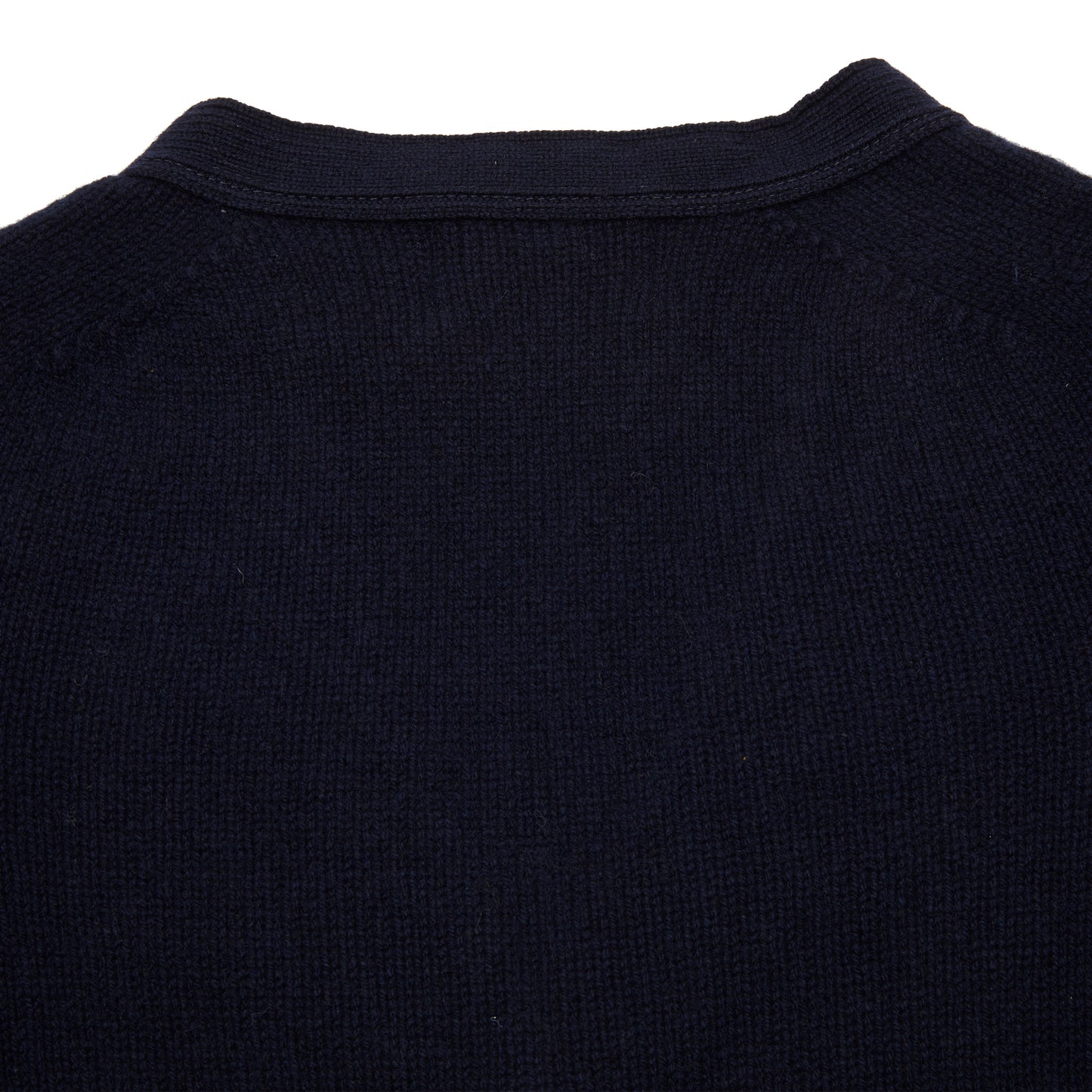 Classic medium-weight cardigan in beautiful soft 100% lambswool spun by Todd & Duncan in Fife and knitted in Peterhead, Scotland. Made in Scotland.