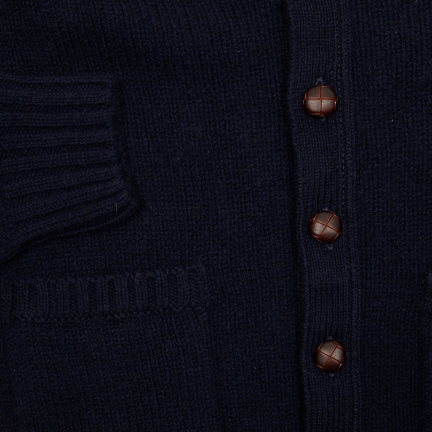Classic medium-weight cardigan in beautiful soft 100% lambswool spun by Todd & Duncan in Fife and knitted in Peterhead, Scotland. Made in Scotland.