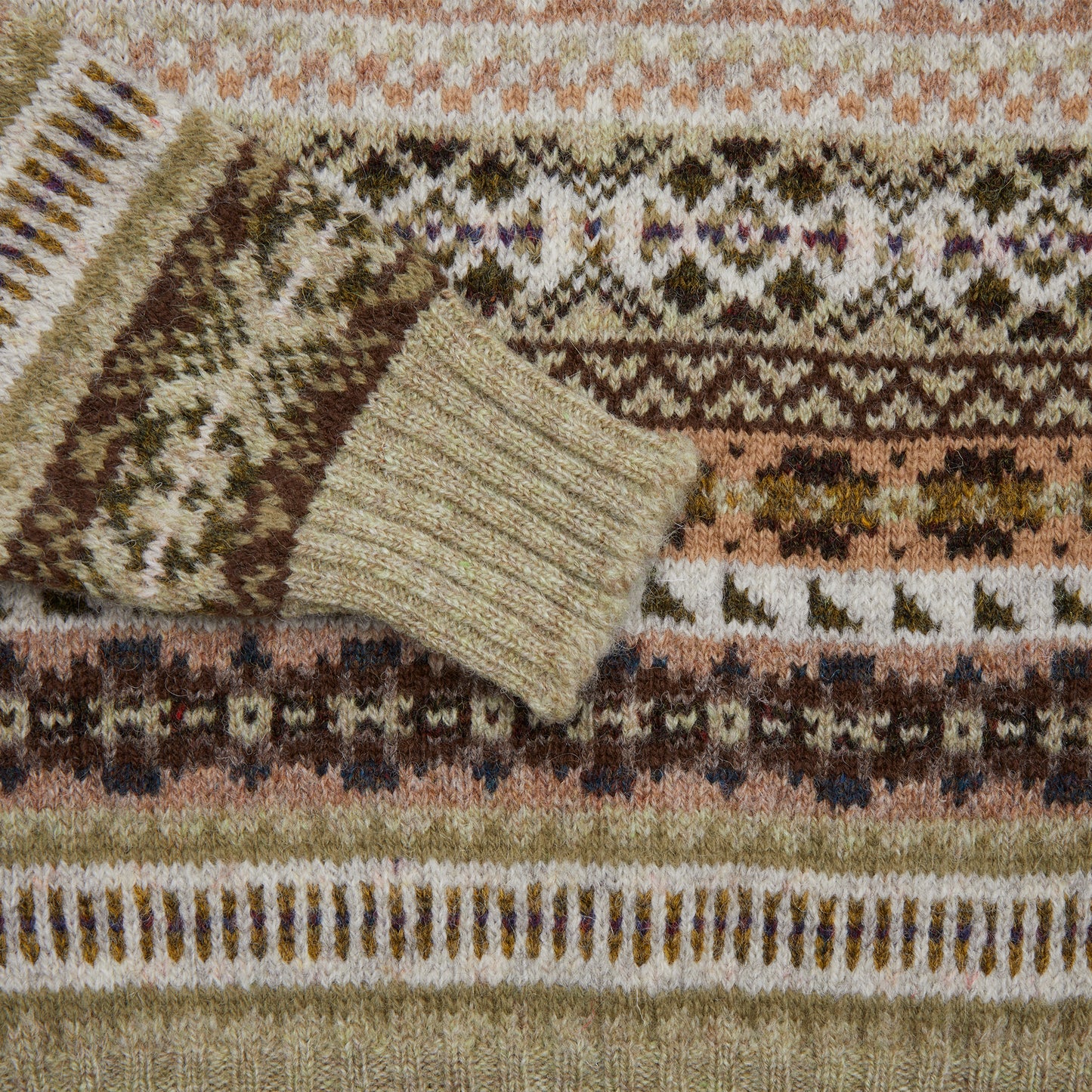 <p>Fair Isle jumper knitted from 100% Shetland wool.</p> <p>Knitted in the Shetland Islands, Scotland.</p>