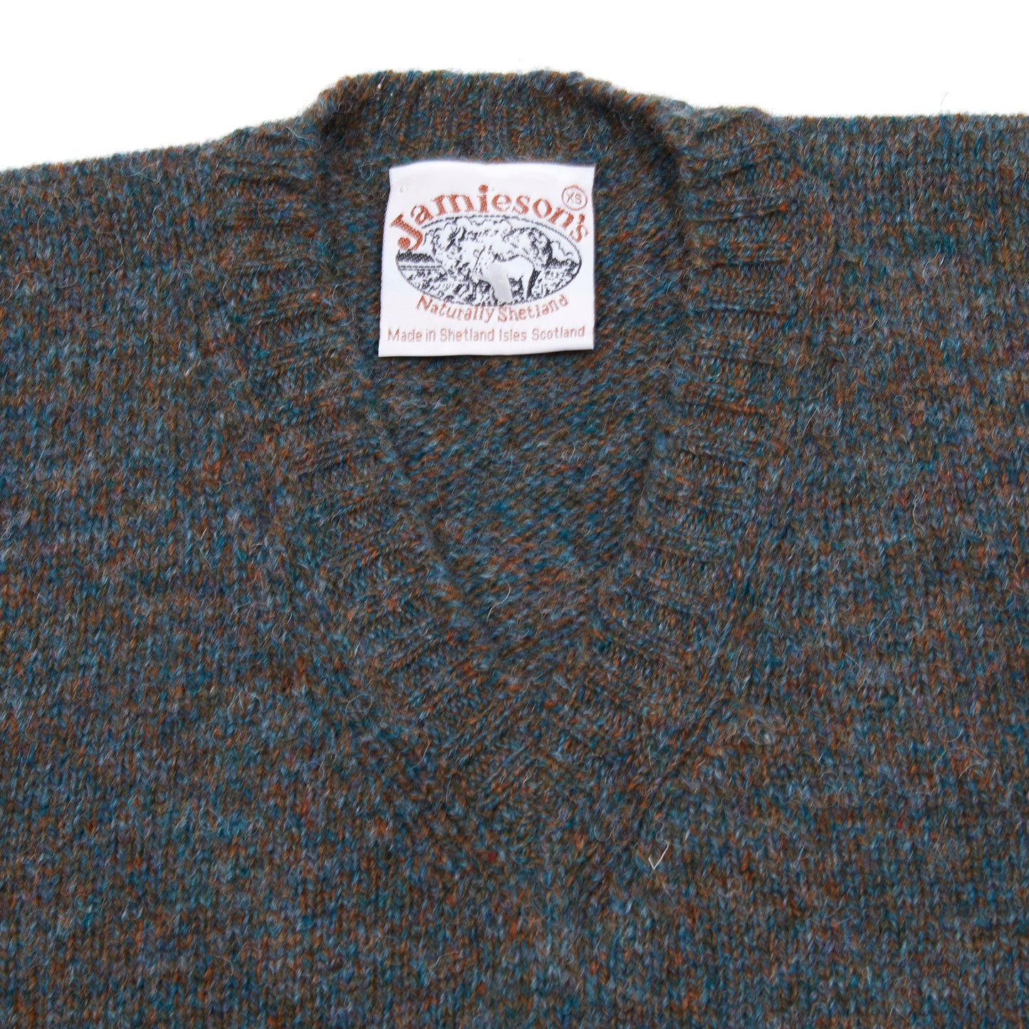 <p>V-neck sleeveless pullover knitted from 100% Shetland wool.</p> <p>Knitted in Shetland.</p>