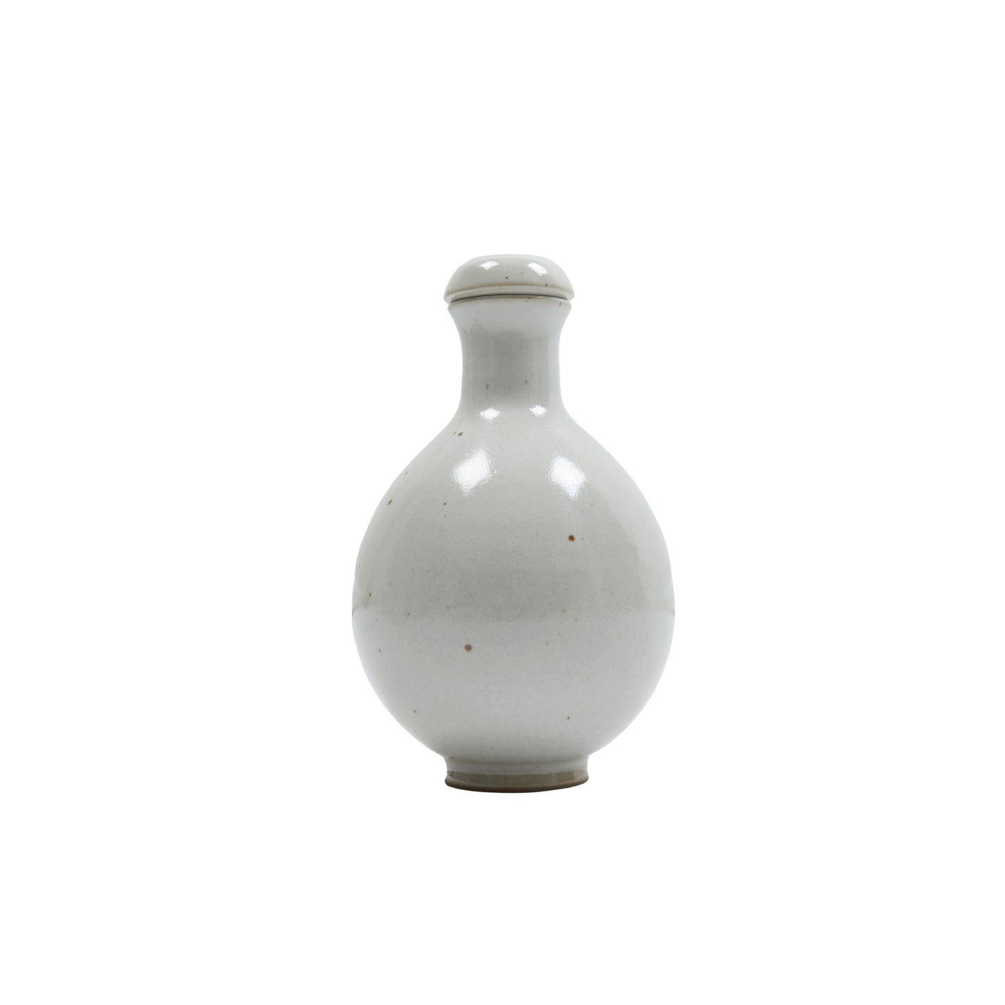 Keramische Werkstatt Margaretenhöhe was founded in 1924 in Essen, Germany. Their hand-crafted beautiful ceramics reflect the formal principles of the Bauhaus. The tableware collection was developed with this in mind resulting in a range of classic, timeless pieces. Keramische Werkstatt Margaretenhöhe hand thrown stoneware bottle with lid. Made in Germany. 18cm H