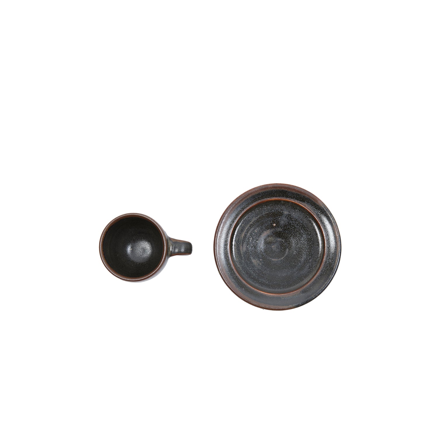 Founded in 1924 in Essen, Germany, Keramische Werkstatt Margaretenhöhe hand-crafted beautiful ceramics reflect the formal principles of the Bauhaus. Their tableware collection was developed with this in mind resulting in a range of classic, timeless pieces. Keramische Werkstatt Margaretenhöhe Hand Thrown Stoneware Espresso Saucer. Handmade in Germany. *Espresso cup and saucer sold separately.
