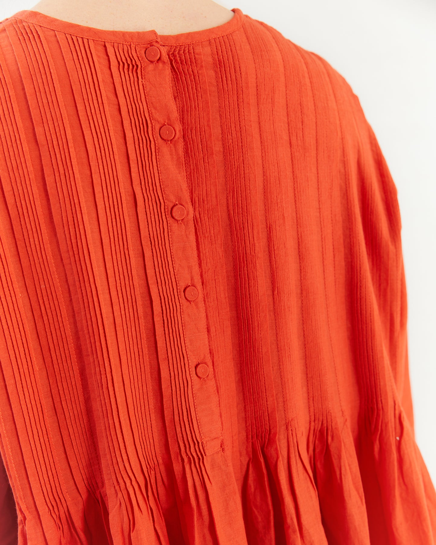 Maison De Soil Crew Neck Shirt With Random Pleats in Orange