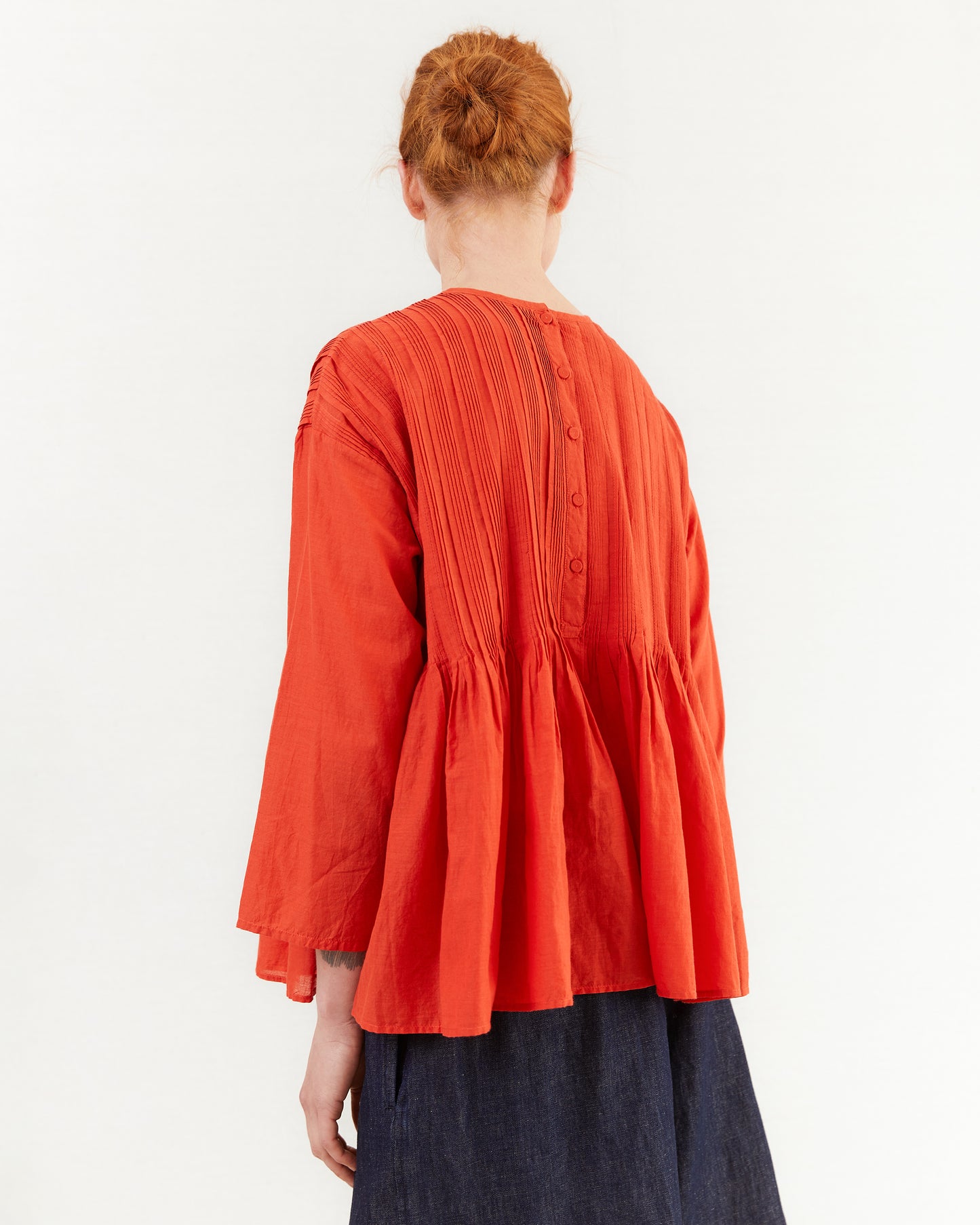 Maison De Soil Crew Neck Shirt With Random Pleats in Orange