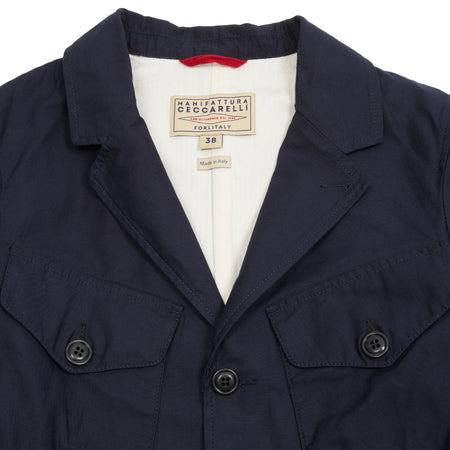 The Bush Jacket has two welt pockets at the bottom and two flap pockets on the chest with a central angle to ease access with opposite hand. This style features a full button closure with buttoned cuffs.  100% Cotton Sateen.  Made in Italy.