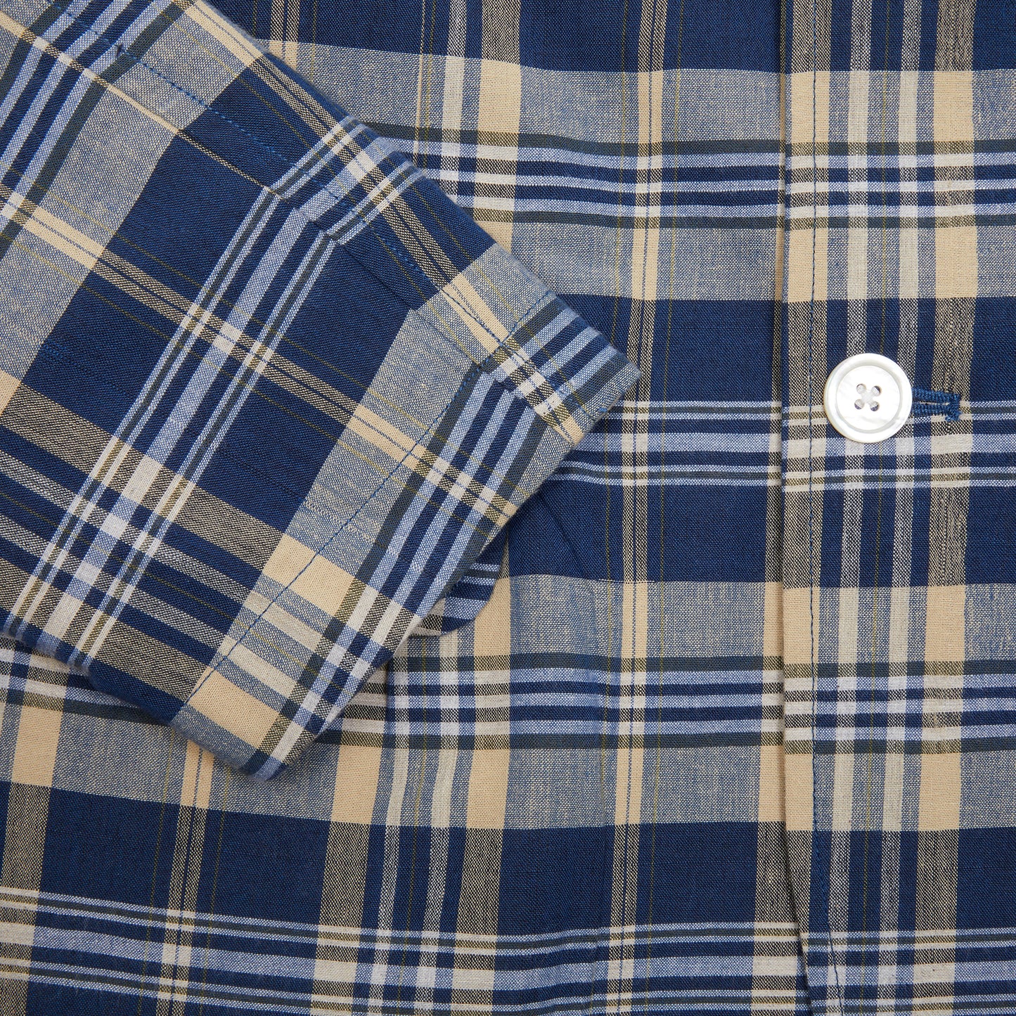 <p>Original Madras Summer Jacket in Blue / Sand Check. Handwoven Madras unstructured, easy jacket with two buttons, single chest pocket, two welted hip pockets with flaps and single back vent. <br></p> <p>100% Cotton.</p> <p>Made in Madras. </p>
