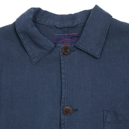 <p>Labura workwear jacket in a lightweight navy linen. This style features 3 patch pockets, shirt collar, and dark brown buttons.</p> <p>100% Linen.</p> <p>Sizing: Small. If you prefer a more generous jacket you should size up.<br><br>Made in Portugal.</p>