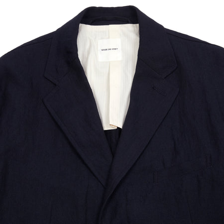 An easy to wear unstructured blazer with peaked lapels.  80% Cotton / 20% Linen  Made in Japan.