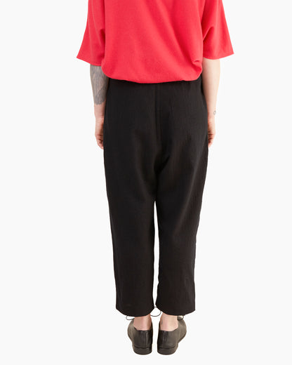 Apuntob Pleated Wool Trousers in Black