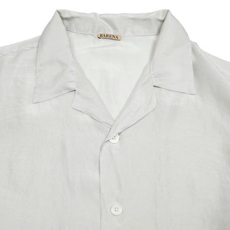 The Solana Tentor Shirt is made from pure ultra-soft silk which is lightweight and cool to the touch. Designed with a camp collar and a relaxed fit, this summer shirt defines casual elegance. 100% Silk. Made in Italy.