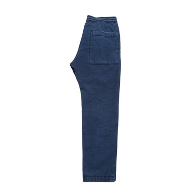 Bativoga Fronda relaxed fatigue style trousers in lightweight cotton seersucker. Washed for a worn in look. Elasticated waist with draw string for extreme comfort.   97% Cotton, 3% Elastane.  Made in Italy.