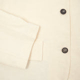 Bea jacket is an oversized blazer in a beautiful off-white Cotton/Linen fabric. Notched lapel, dropped shoulder with three button fastening, two flap pockets.   72% Cotton, 28% Linen. 