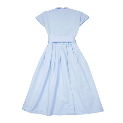 Elegant capped-sleeve shirt dress in sky blue, crisp cotton. Dress buttons to the waist with a concealed placket. Volume is created through the skirt with box pleats, two hip pockets are concealed in the side seams. Cinch the dress to exaggerate the waist with self fabric sash, or wear without. Dress length finishes mid-calf.   100% Cotton.
