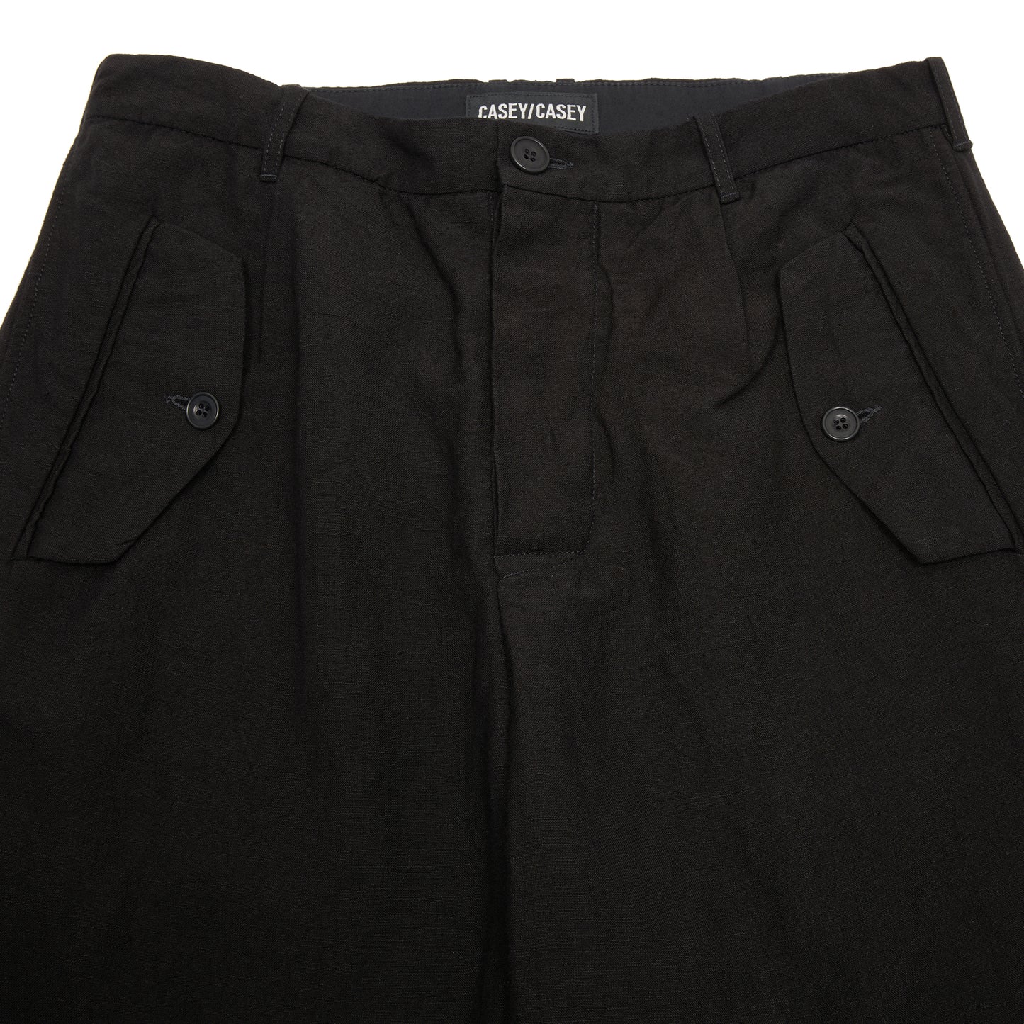 Casey Casey Hiroshi Pant in Black. Relaxed fit casual trouser with flap pockets.