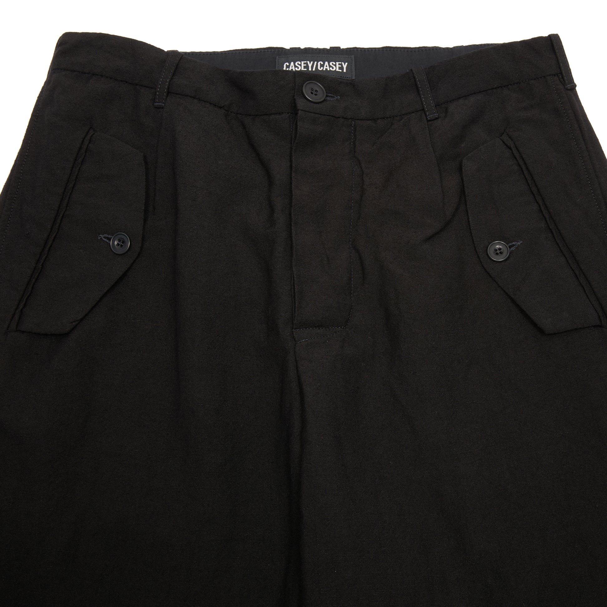 Casey Casey Hiroshi Pant in Black. Relaxed fit casual trouser with flap pockets.
