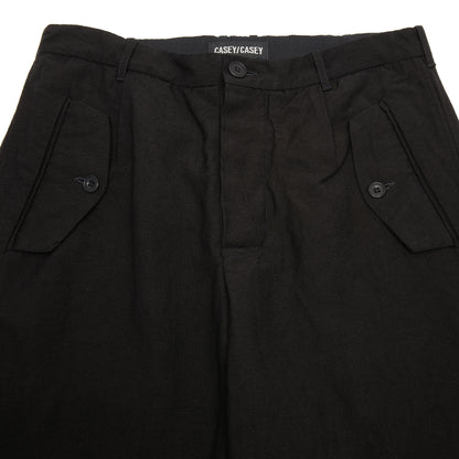 Casey Casey Hiroshi Pant in Black. Relaxed fit casual trouser with flap pockets.