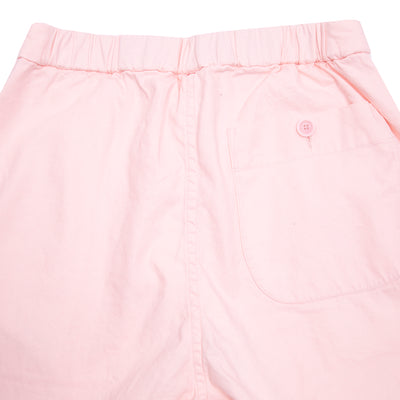Jude Pant in Pink is a classic relaxed fit tapered trouser with half elasticated waist, waist buckle details and single back patch pocket. Woven in a crisp cotton linen twill that drapes and flows beautifully.   56% Linen, 44% Cotton.  Made in Portugal.