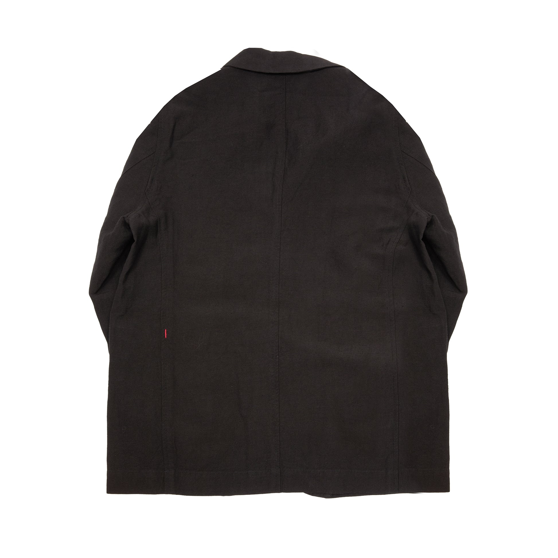 Casey Casey Jak Pat  Reversible Jacket in Black. A three-button jacket with button flap pockets and lapels.