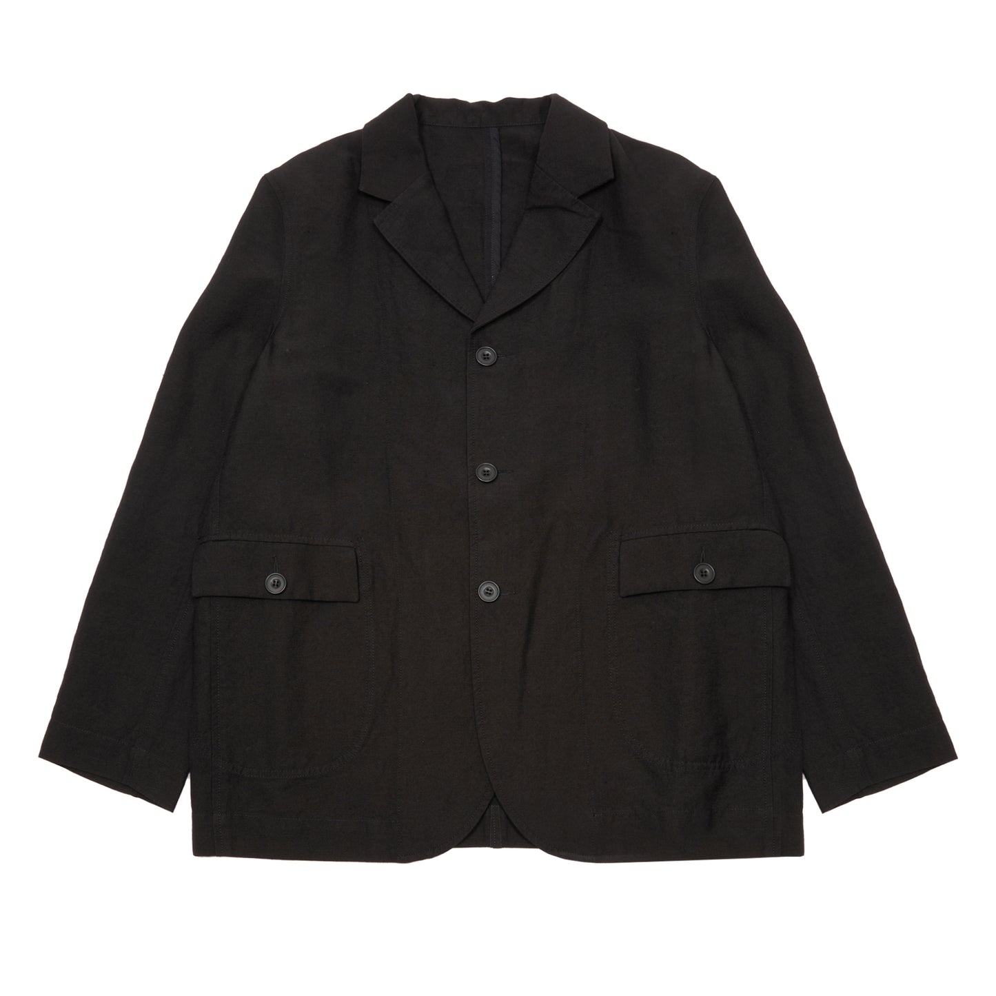Casey Casey Jak Pat  Reversible Jacket in Black. A three-button jacket with button flap pockets and lapels.