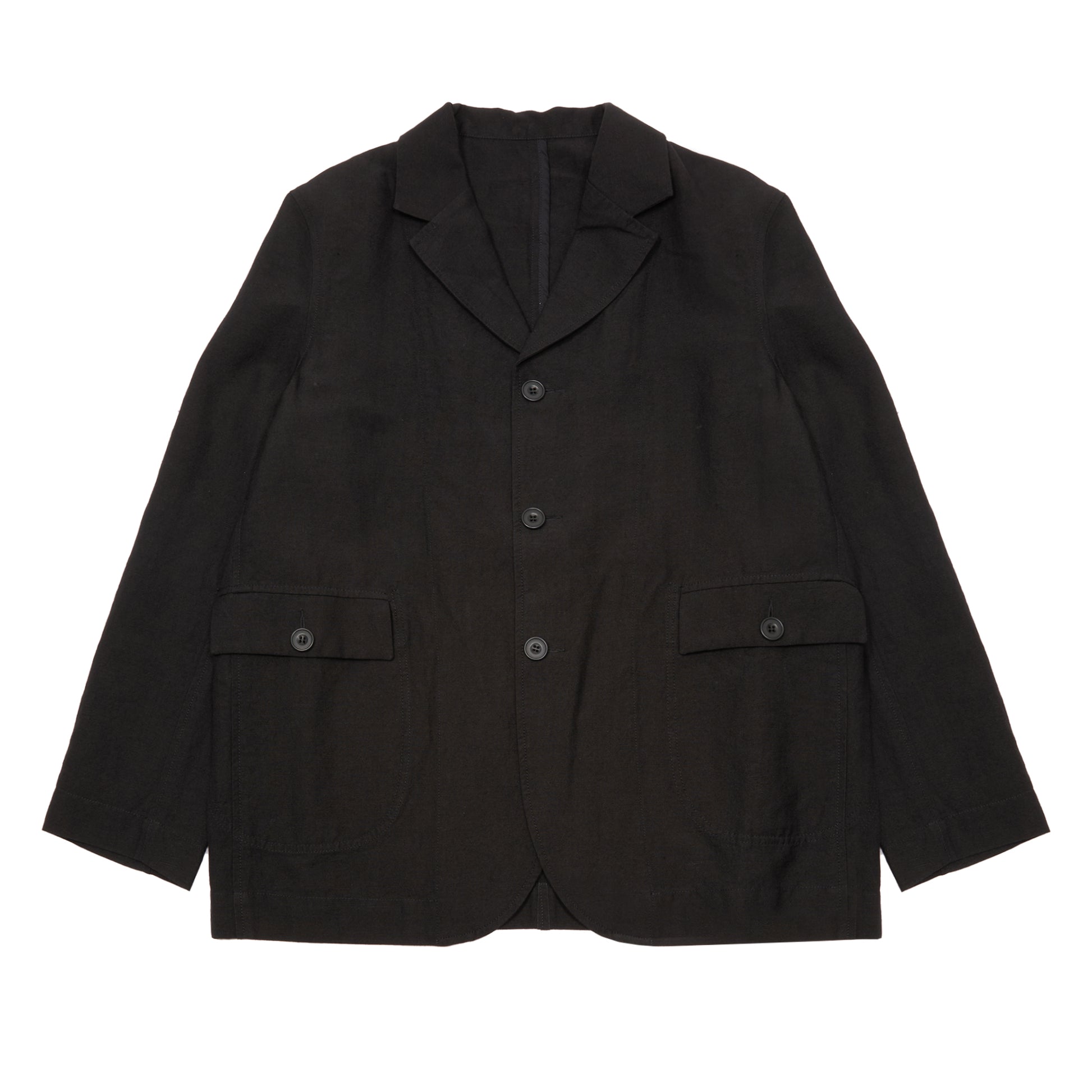Casey Casey Jak Pat  Reversible Jacket in Black. A three-button jacket with button flap pockets and lapels.