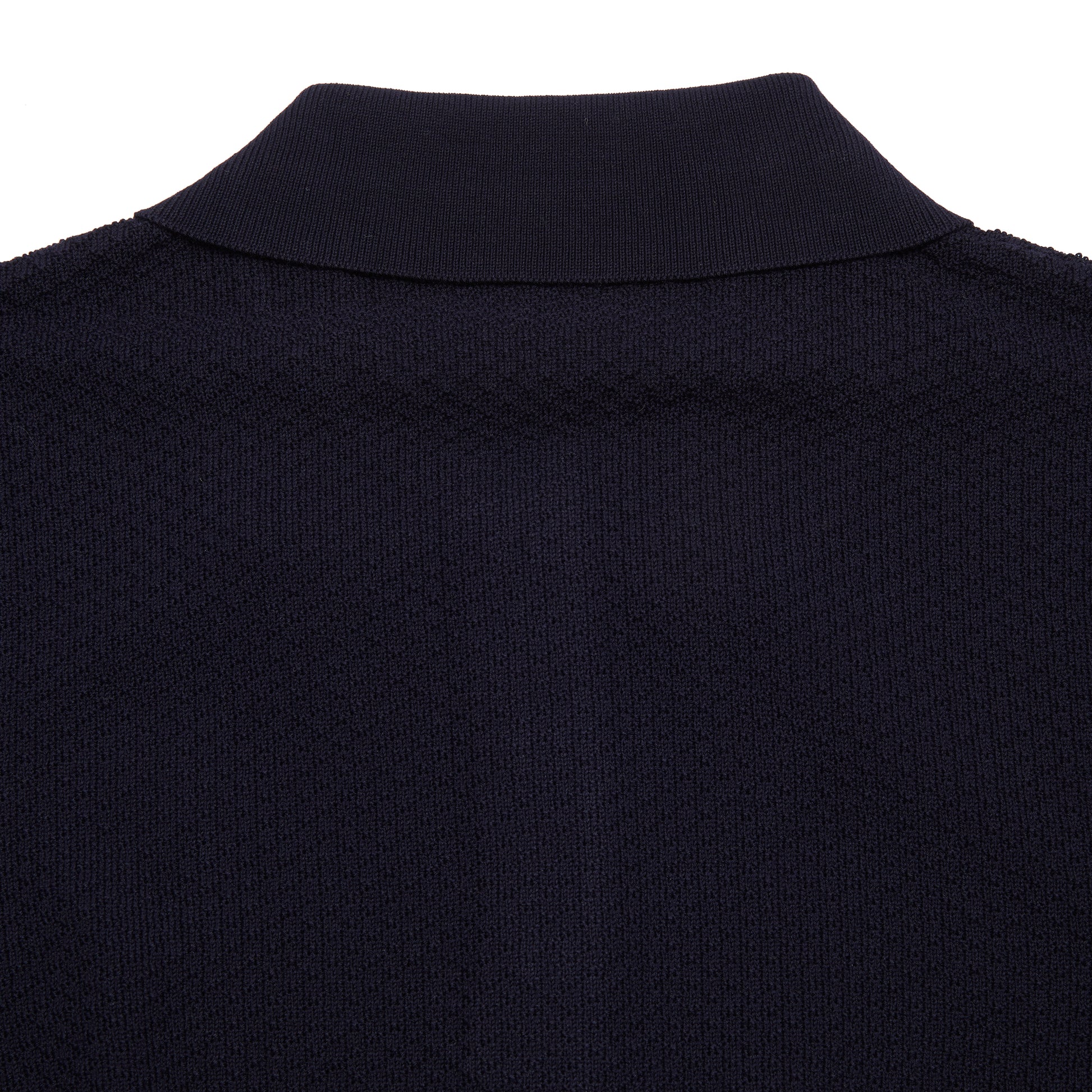 <p>Short sleeve Polo Shirt in light crisp cotton with a textured pattern and contrasting ribbed hems and collar.</p> <p>Made in Italy.</p>