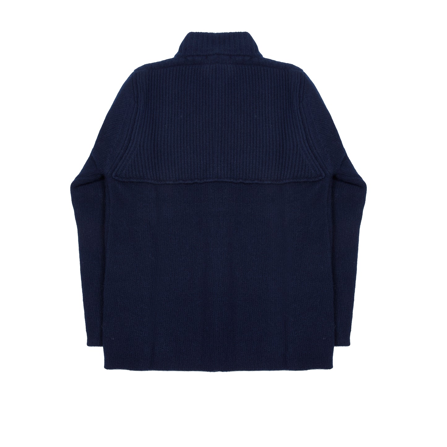 In solid navy, the Storm Jacket from Inis Meáin is inspired by island life and outdoor working in all weathers. Featuring knitted shoulder patches providing additional warmth and protection, patch pockets, a funnel collar, and finished with real horn buttons. The Storm Jacket is both functional and elegant.  70% Merino Wool, 30% Cashmere.   Made in Ireland.