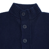 In Marino blue, the Storm Jacket from Inis Meáin is inspired by island life and outdoor working in all weathers. Featuring knitted shoulder patches providing additional warmth and protection, patch pockets, a funnel collar, and finished with real horn buttons. The Storm Jacket is both functional and elegant.  70% Merino Wool, 30% Cashmere.   Made in Ireland.
