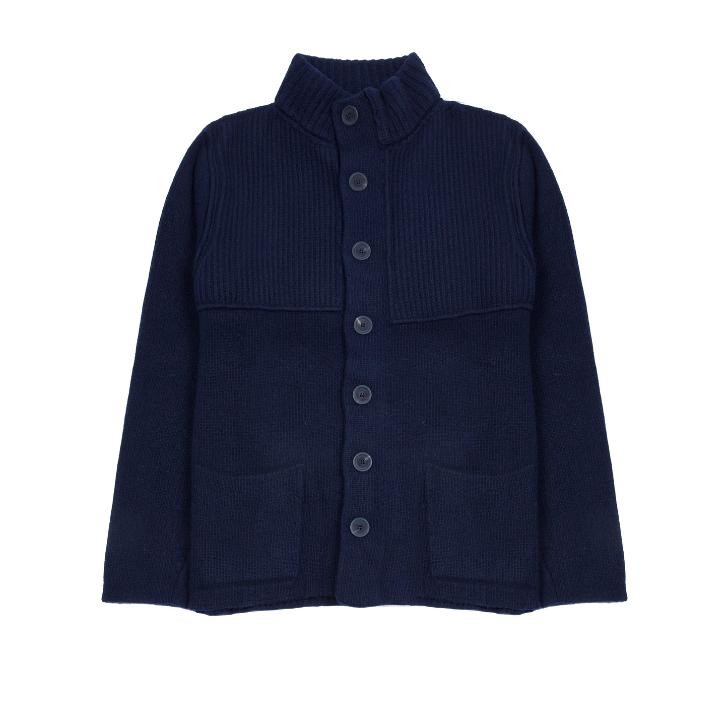 In solid navy, the Storm Jacket from Inis Meáin is inspired by island life and outdoor working in all weathers. Featuring knitted shoulder patches providing additional warmth and protection, patch pockets, a funnel collar, and finished with real horn buttons. The Storm Jacket is both functional and elegant.  70% Merino Wool, 30% Cashmere.   Made in Ireland.