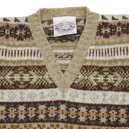 Fair Isle V-neck sleeveless pullover knitted from 100% Shetland wool. Knitted in Shetland.