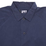 Ermou Kroynor Jacket with full button closure, shirt-style collar, two front patch pockets, and a raglan sleeve. This style has a wide, oversized cut for volume. The fabric has a crisp feel and will develop a unique patina over time through each wear. 79% Cotton, 21% Polyamide. Made in Italy.