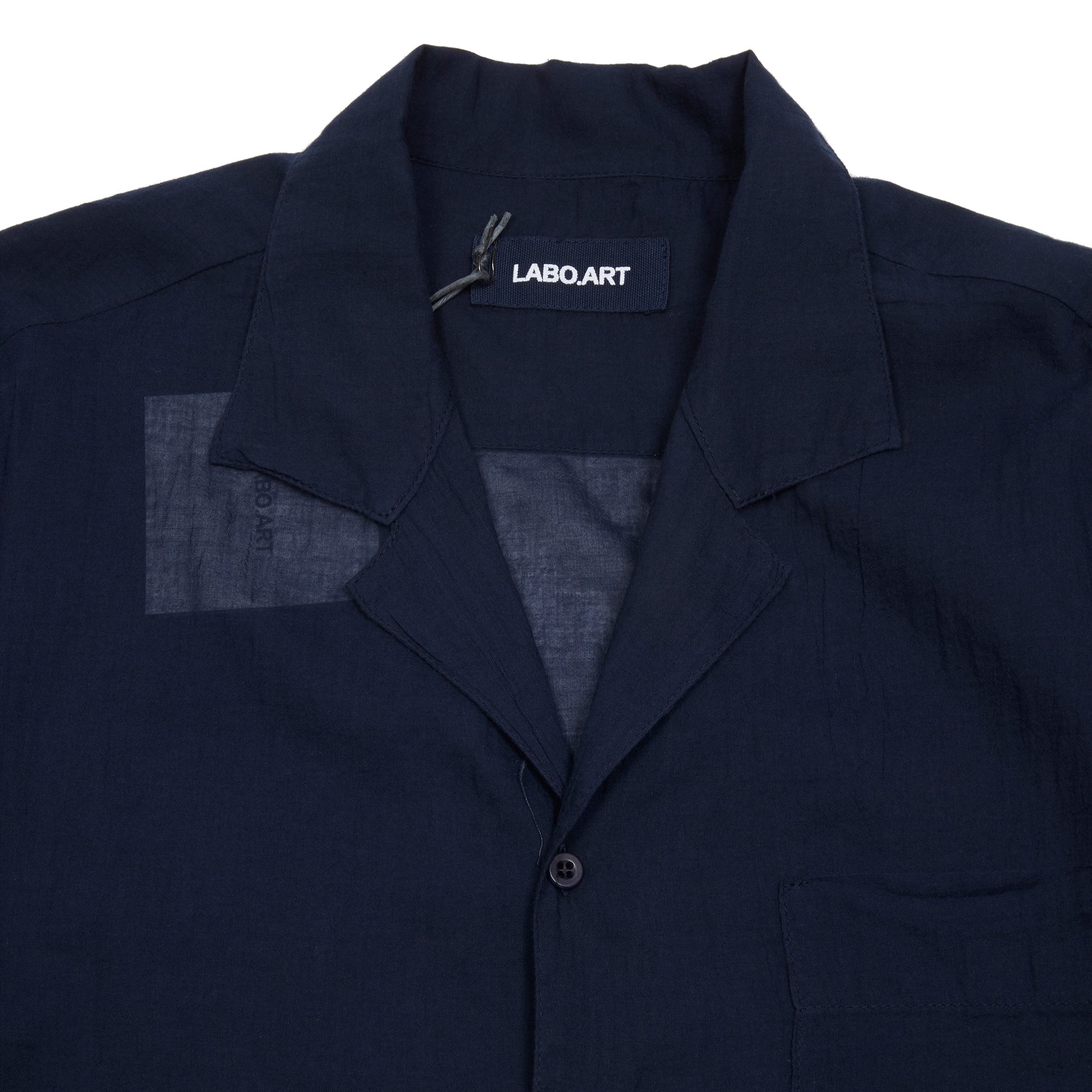 A lightweight cotton shirt with camp collar and single chest patch pocket. Cut for an easy, slightly oversized fit. 100% Cotton. Made in Italy.