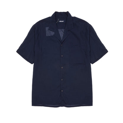 A lightweight cotton shirt with camp collar and single chest patch pocket. Cut for an easy, slightly oversized fit. 100% Cotton. Made in Italy.