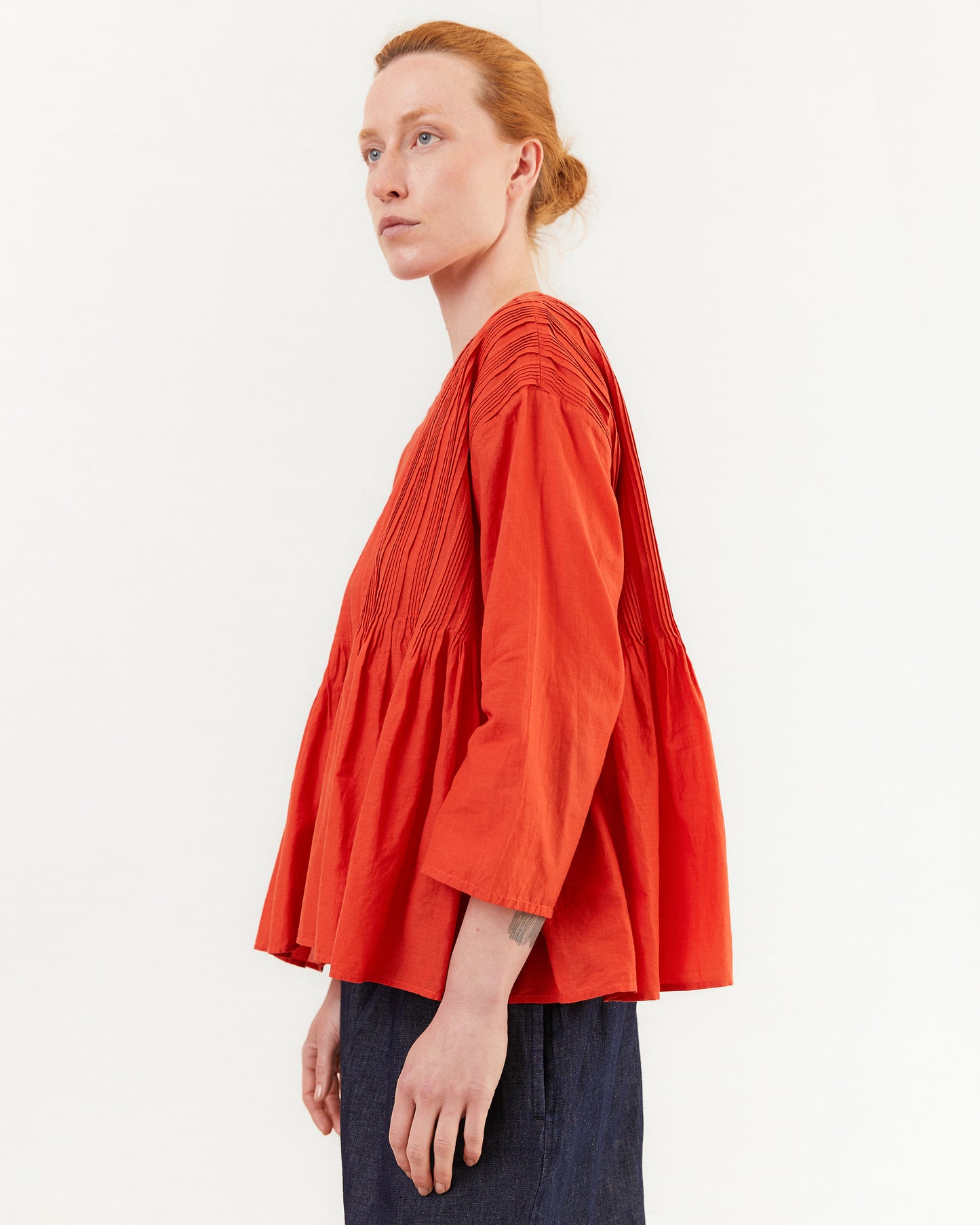 Maison De Soil Crew Neck Shirt With Random Pleats in Orange