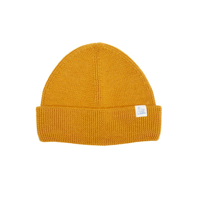 Watch Cap in Honey crafted from high quality, mulesing-free certified merino wool. A modern short fit with turn-up.  100% Merino Wool.  Made in Portugal.