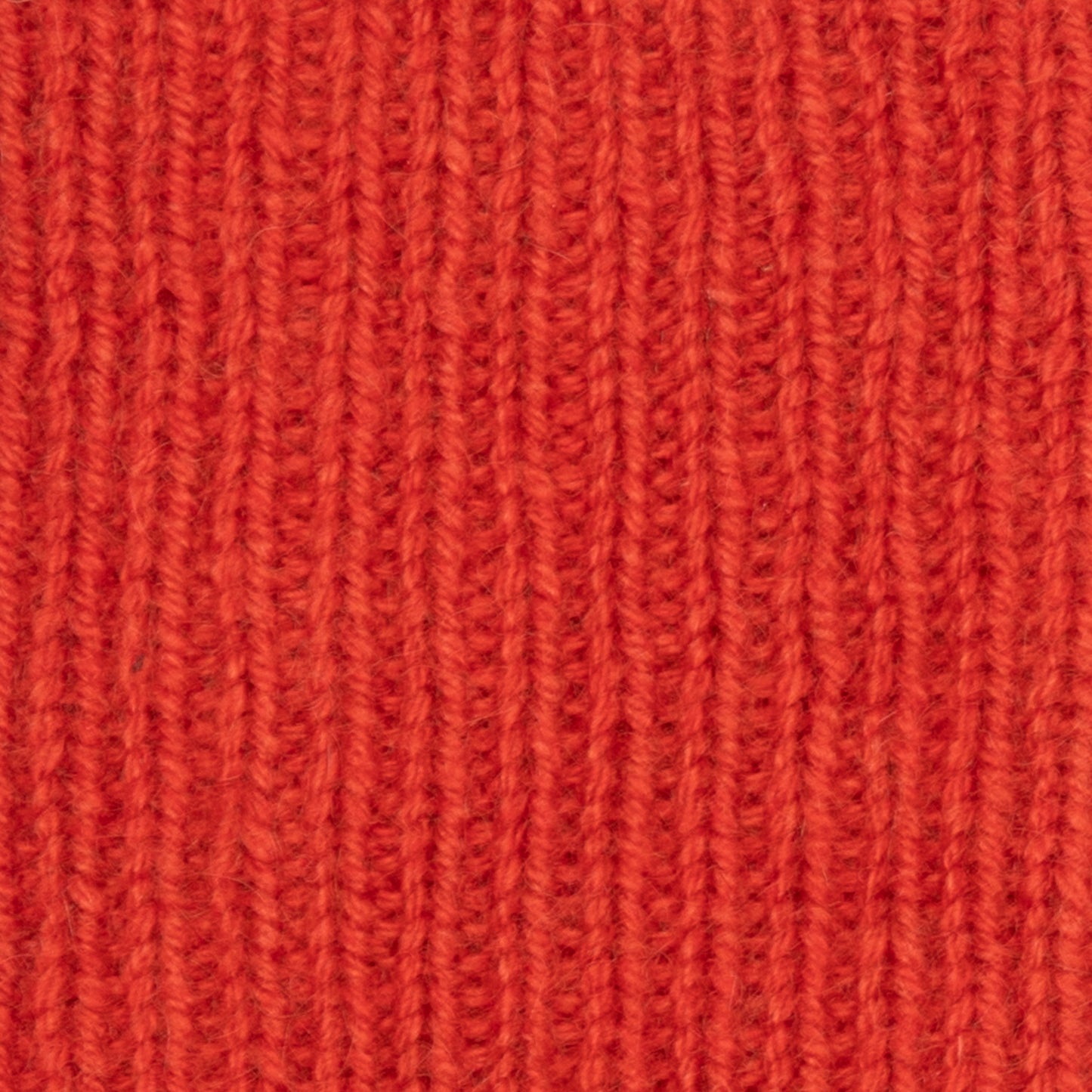 Norlha Cuffed Wrist Warmers in Flame Red
