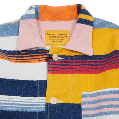 <p>Madras Stout Shirt Jacket in an incredible handwoven cotton, multicoloured stripe. Like the Original Madras beach mats, each over shirt is unique in fabrication. Jacket features three patch pockets, square hem, and natural Corozo buttons.&nbsp;<br></p> <p>100% Cotton.</p> <p>Made in Madras.</p>