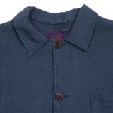 <p>Labura workwear jacket in a lightweight navy linen. This style features 3 patch pockets, shirt collar, and dark brown buttons.</p> <p>100% Linen.</p> <p>Sizing: Small. If you prefer a more generous jacket&nbsp;you should&nbsp;size up.<br><br>Made in Portugal.</p>