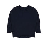 A cotton jersey long-sleeve t-shirt with dropped shoulders and raw hem finishes. This style features a curved hem with notch detail, and twisted side seams.  100% Cotton.  Made in Japan.