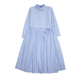 A shirt-style dress with a two button placket and cuffed full-length sleeves. Featuring a striped pattern, thin waist belt, and invisible in-seam pockets. The waist is gently pleated to give the skirt volume. Crafted from a soft and supple cotton.  100% Cotton.  Made in Japan.