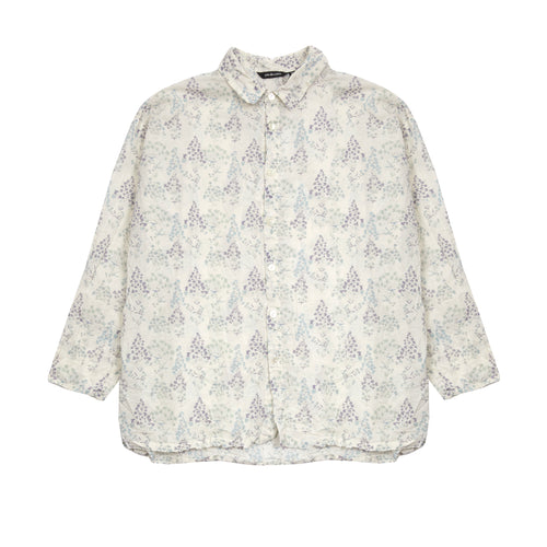 The Calamint Print Shirt in Cotton/Linen features a relaxed fit with a miniature collar. This garment is finished with an all over botanical print and is intentionally creased for a 'worn-in' look.  88% Cotton, 12% Linen.  Made in Japan. 