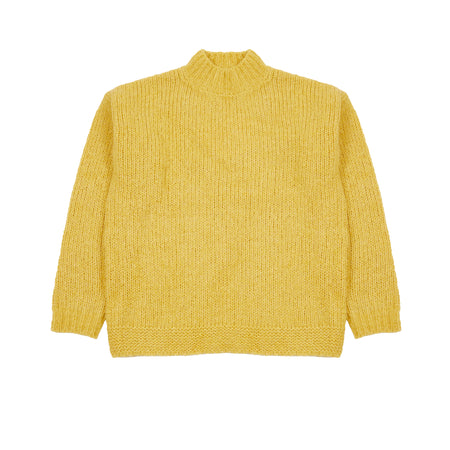 The Plasterer Jumper in Sulphur is a luxuriously soft chunky knit alpaca wool jumper with a high neck, long sleeve and oversized boxy fit. The neck and cuff both feature comfortable rib details and the sides features small side vents to sit easily at the waist.  62% Baby Alpaca, 11% Fine Merino, 27% Bio Cotton.   Made in U.K.