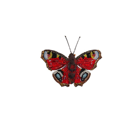 Red beaded butterfly brooch. 