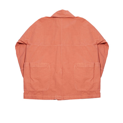 The Buoy Jacket in Burnt Sienna is made from a compact washed paper cotton fabric, giving it a lightweight and broken-in look and feel. Constructed without side seams or armholes, featuring two patch pockets, each divided into three sections that wrap around to the back of the jacket, deep cuffs, a wide collar, and a single vent. 80% Cotton, 18% Tencel, 2% Elastane. Made in England. Size 1 is equivalent to a UK women's 10 and a men's Small.
