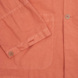 The Buoy Jacket in Burnt Sienna is made from a compact washed paper cotton fabric, giving it a lightweight and broken-in look and feel. Constructed without side seams or armholes, featuring two patch pockets, each divided into three sections that wrap around to the back of the jacket, deep cuffs, a wide collar, and a single vent. 80% Cotton, 18% Tencel, 2% Elastane. Made in England. Size 1 is equivalent to a UK women's 10 and a men's Small.